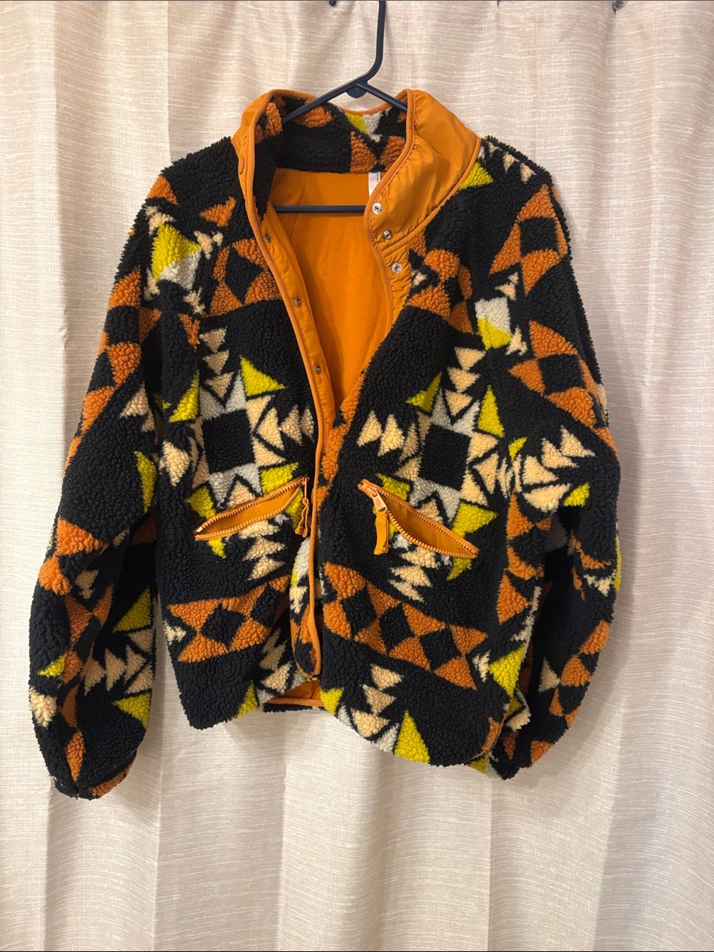 Free people hit the slopes Geometric Pattern Sherpa Jacket in Black & Orange